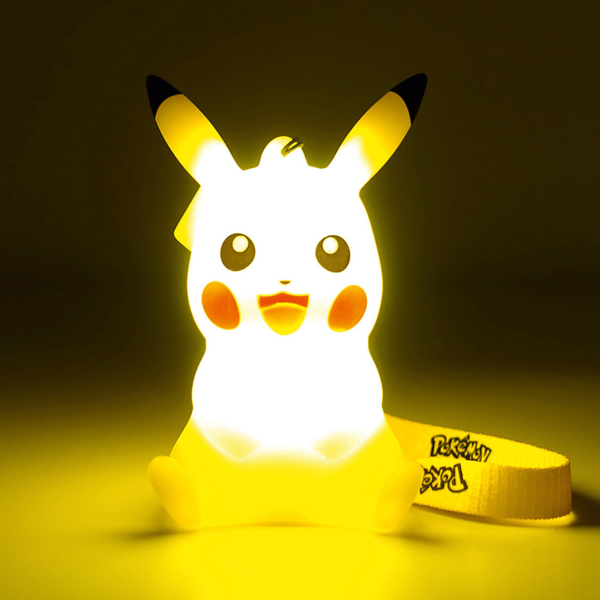 Pokémon - Leuchtender Pikachu 6 cm + Handschlaufe